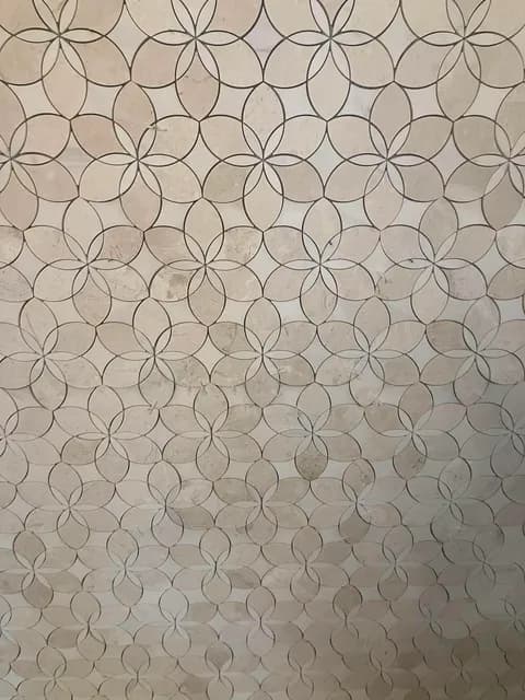 Finished marble floral-mosaic floor — full detail of the circle-and-petal design