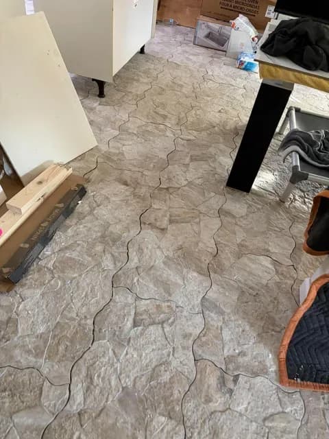 Close view of the flagstone pattern in a new stone-look tile floor