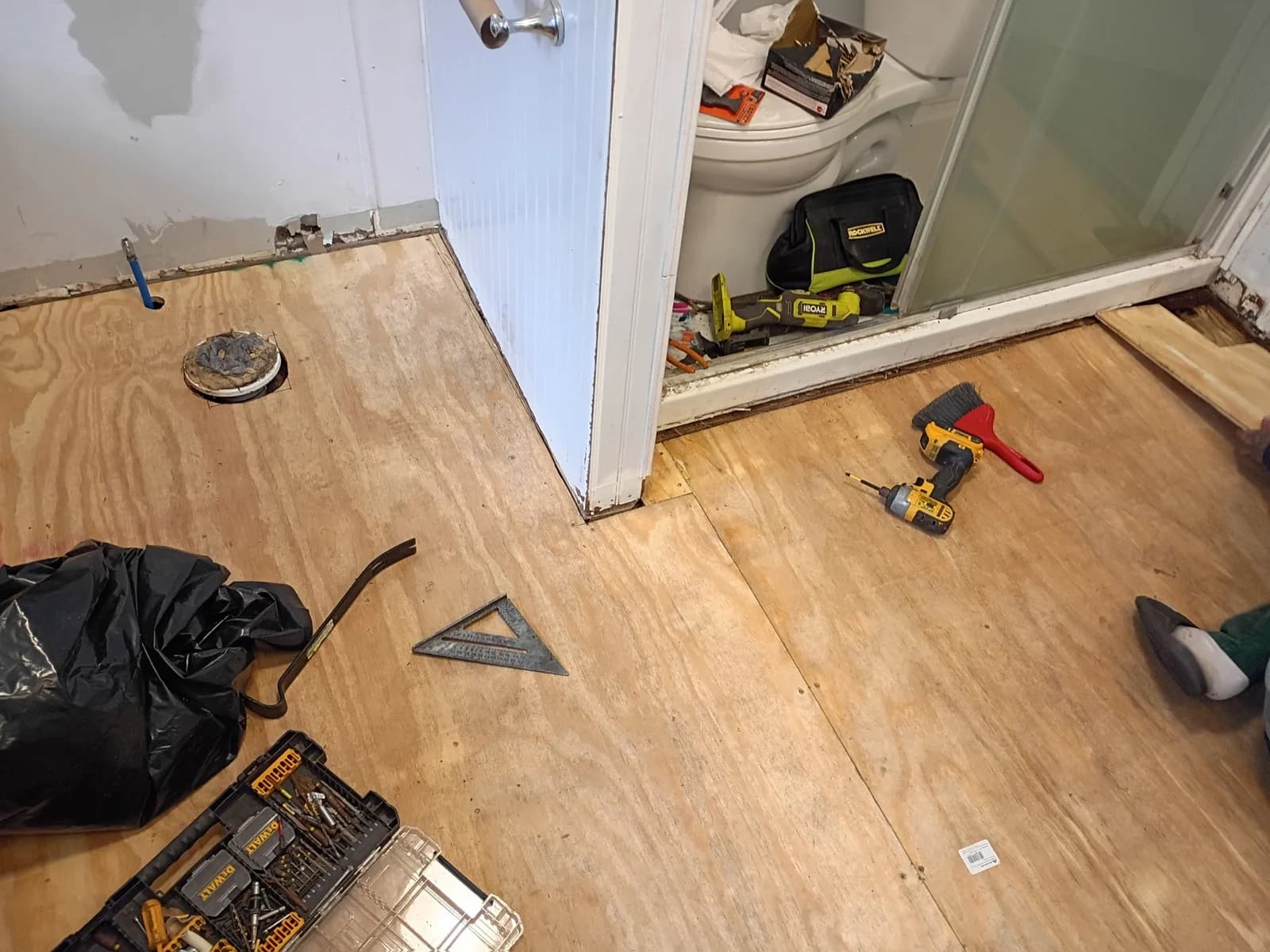 Plywood subfloor complete — ready for cement board