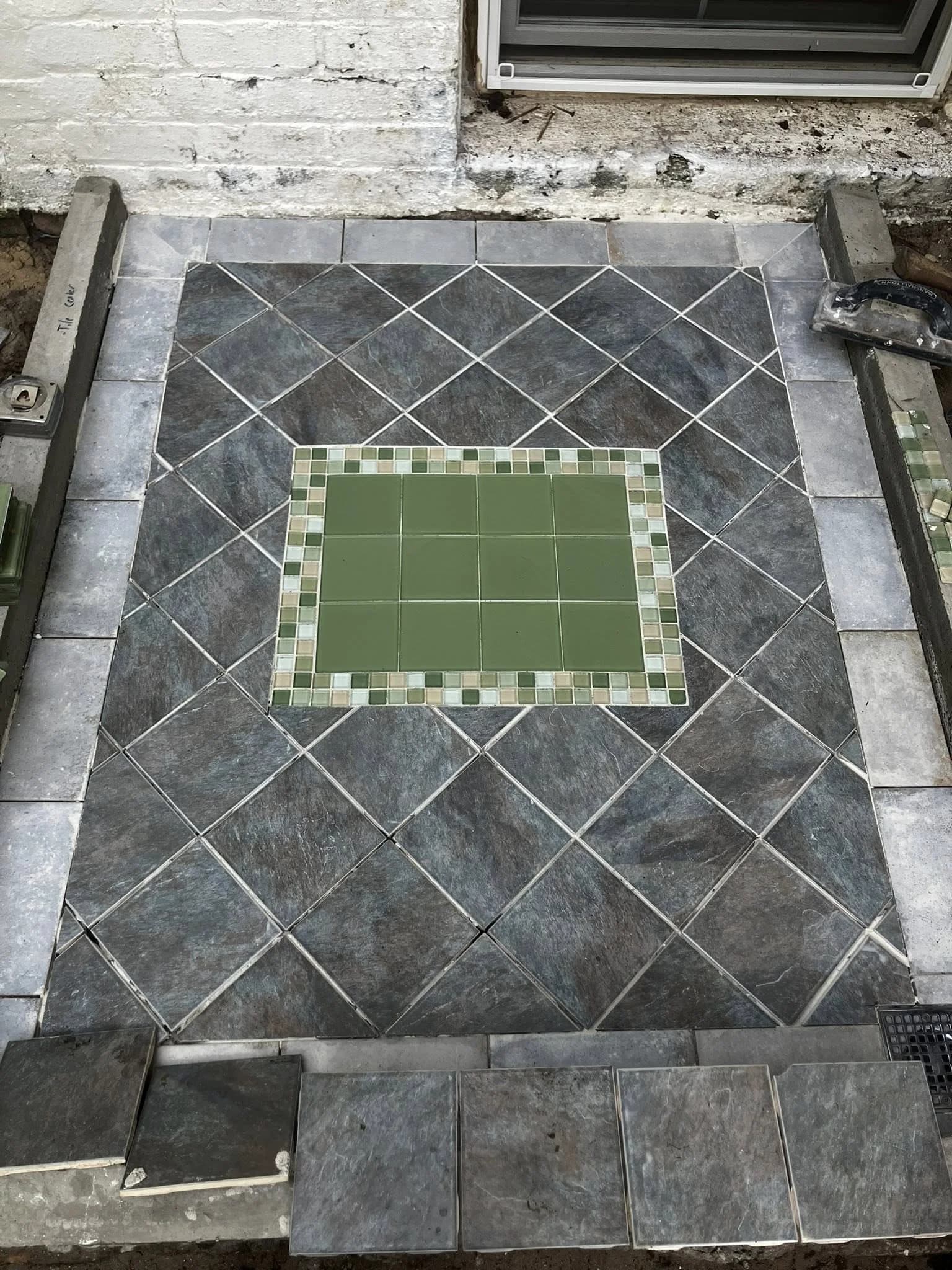 Outdoor patio with professionally installed large-format tile work